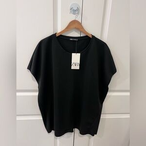 Zara NWT women’s XL long sleeveless black poly shirt